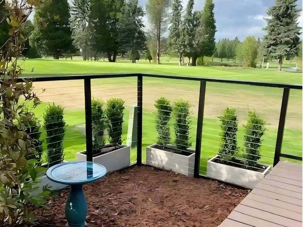 White rectangular GRC planters used in an outdoor landscape setting
